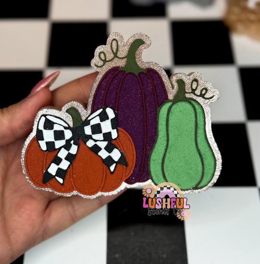 Three Pumpkins